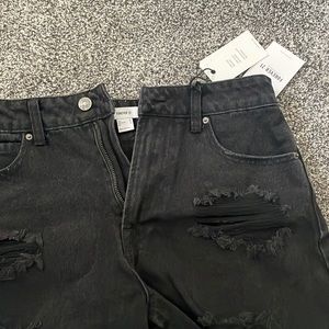 Black cutoff denim shorts